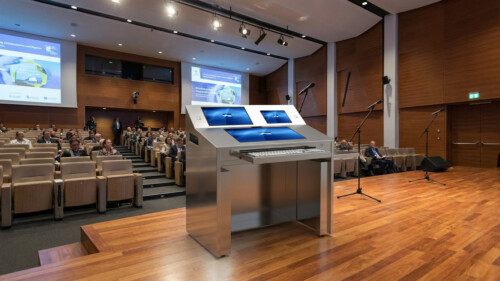 Interactive and motorized multimedia podium with rack included